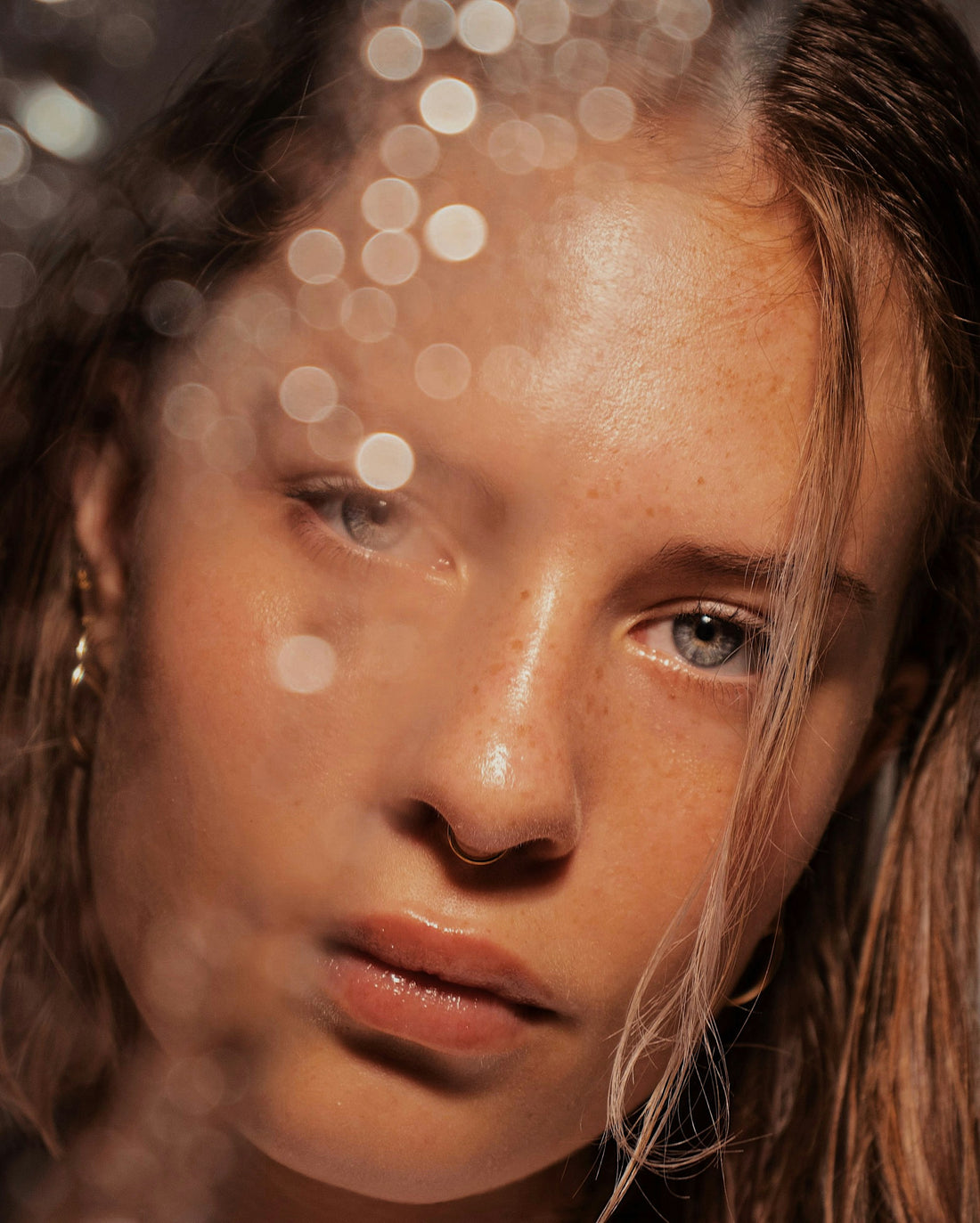 Close portrait of a woman with smooth, firm skin, representing anti-wrinkle skincare results